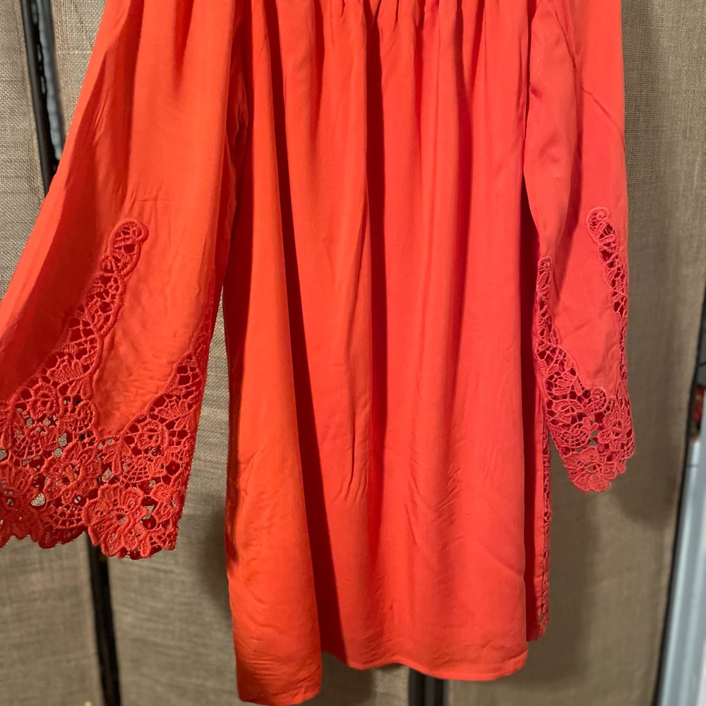 Beautiful orange off the shoulder dress, never worn.